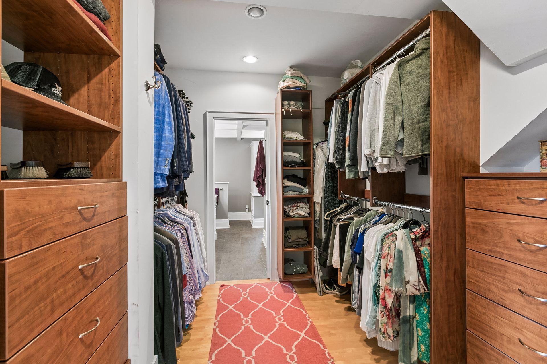 Primary bedroom closet with pass thru to 2nd level full bathroom