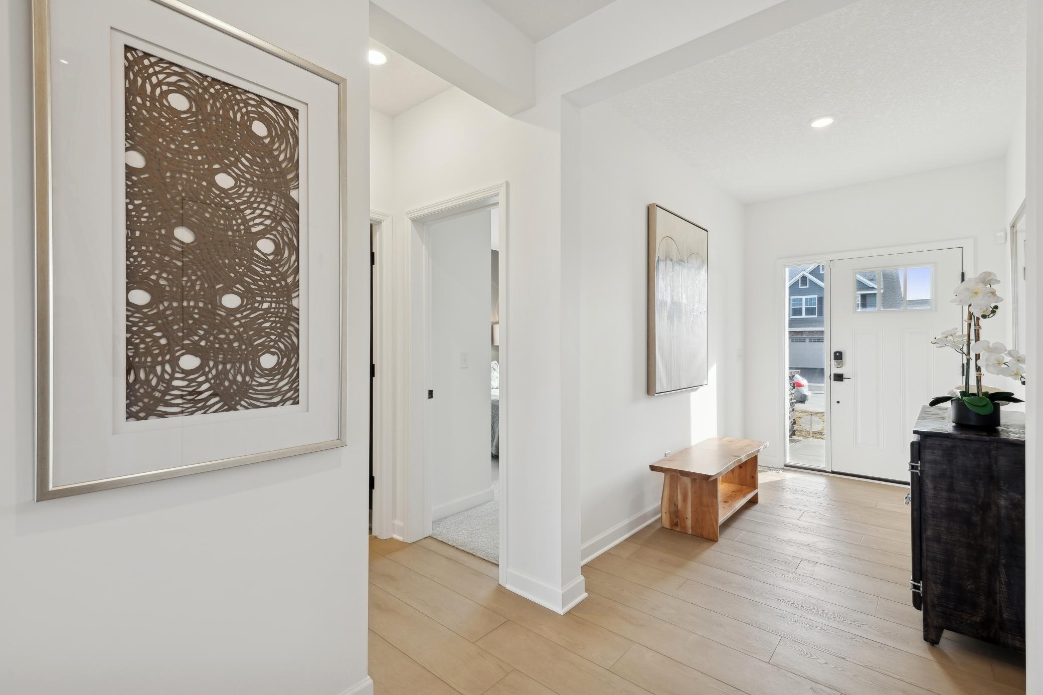 (Photo of decorated model, actual home's finishes will vary) Make the best first impression with this bright and open foyer.