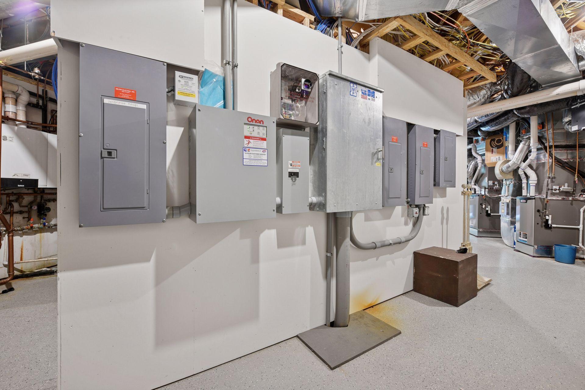 Electrical area of mechanical room. First box is for an emergency generator for all necessary functions of home. Part of the magic of this home is all of the conveniences!