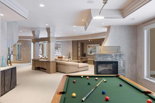 Three sided fireplace will be enjoyed in all areas. Spacious billiards area with ample room for play — no worries about bumping the walls!