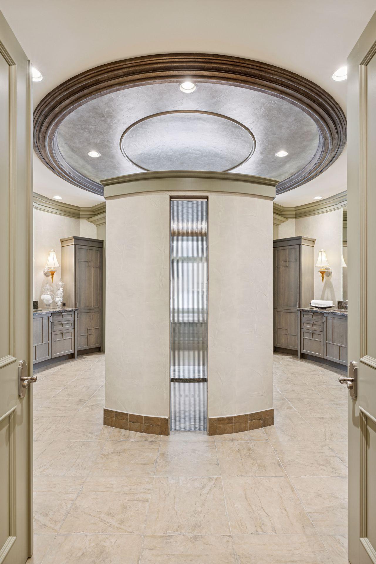 Shower creates stunning entrance to Primary Bath.