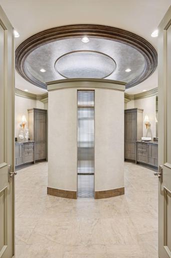 Shower creates stunning entrance to Primary Bath.