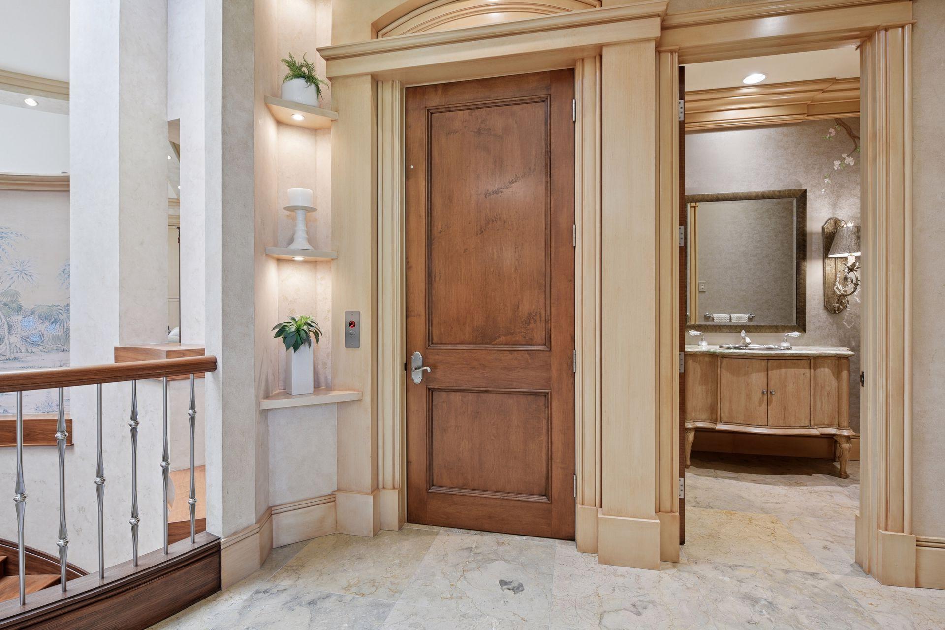 Elevator and two staircases to access the lower level.