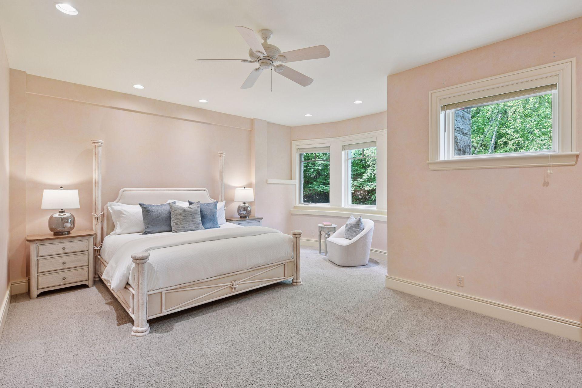 Impressively large bedroom offering a walk-in closet and full ensuite bath, newly painted in a versatile neutral tone.