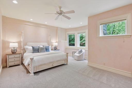 Impressively large bedroom offering a walk-in closet and full ensuite bath, newly painted in a versatile neutral tone.