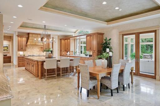 Beautiful and functional kitchen, dinette, and four-season porch.