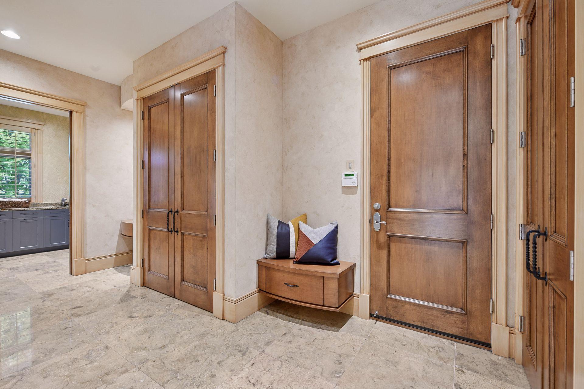 Back entry with abundant closet space. All closets have lights that turn on when you open the doors.