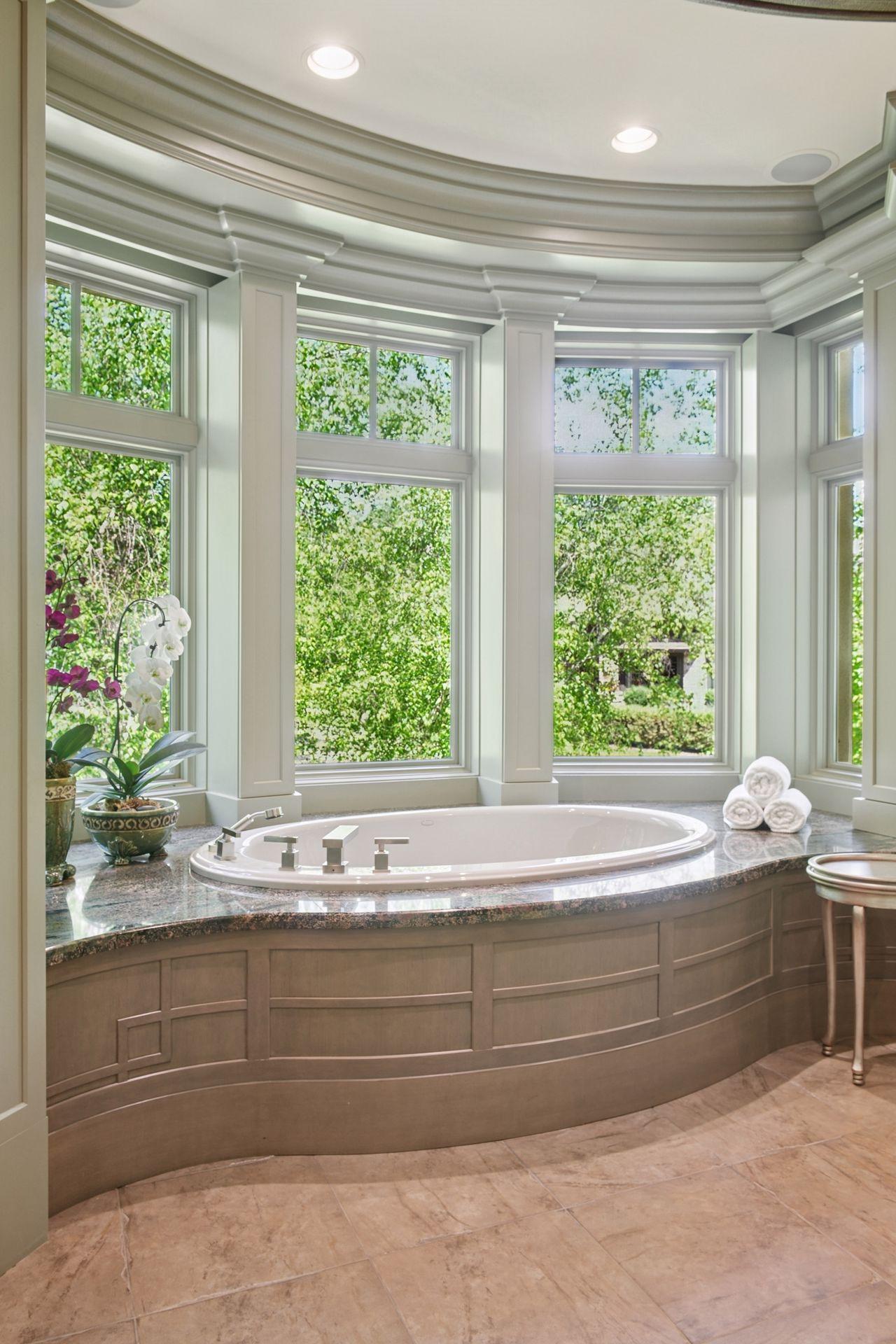Deep luxurious soaking tub - electric blinds!