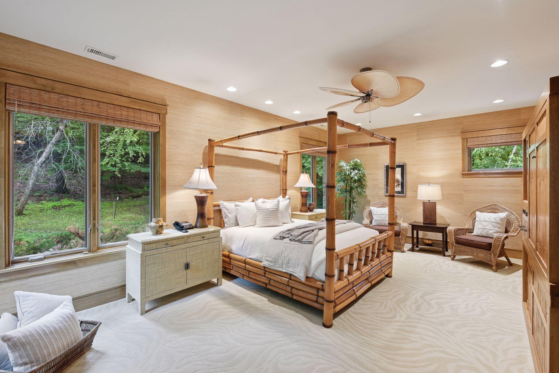 Beautiful bedroom with a walk-in closet; the stylish motif carries seamlessly into the adjoining 3/4 bath.