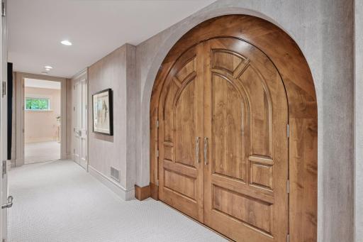 Gorgeous doors leading to your impressive wine cellar.