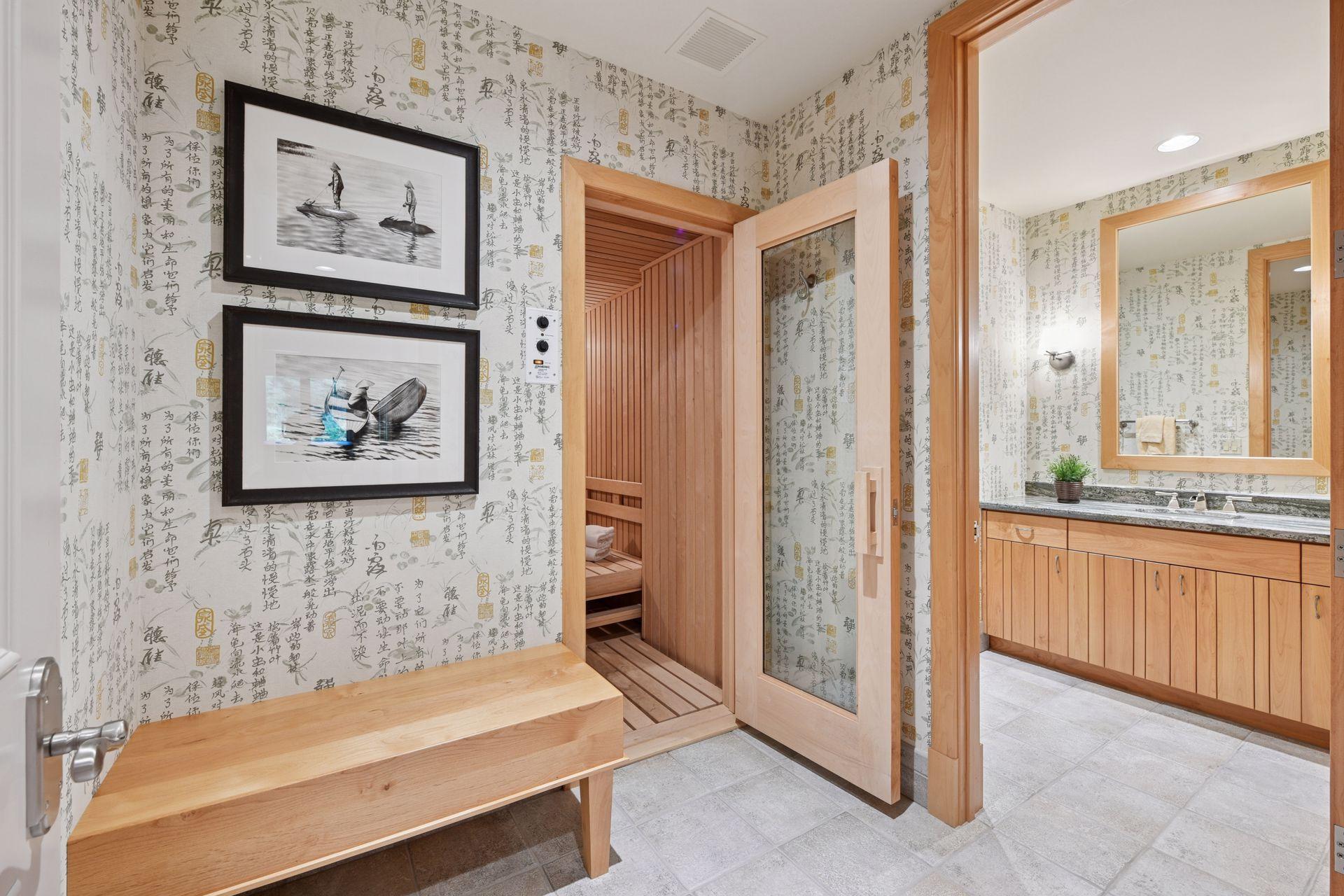 Sauna is located in bath near the exercise room.