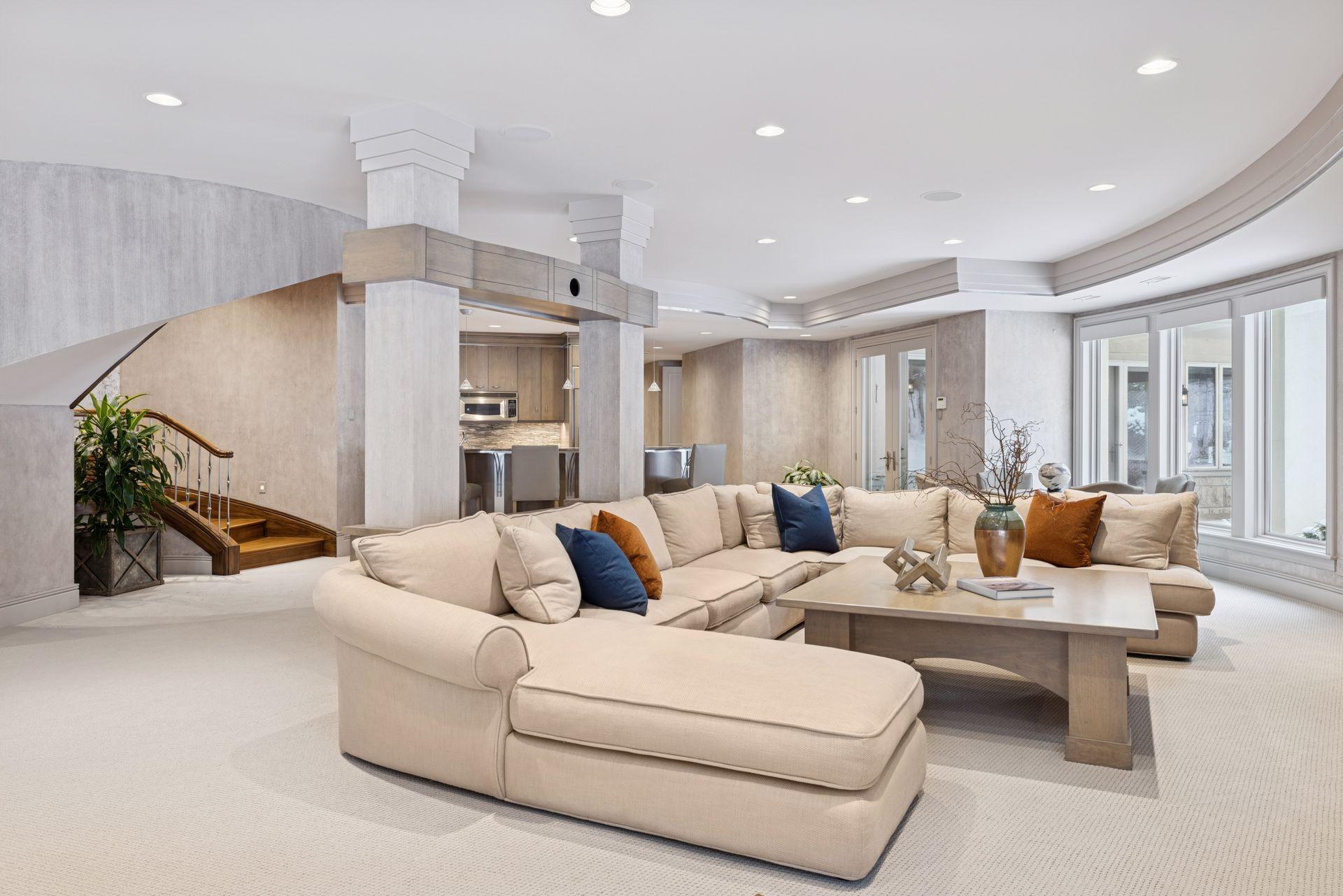 Inviting lower level perfect for entertaining with adjacent bar and projection TV for cheering on your favorite sports teams.