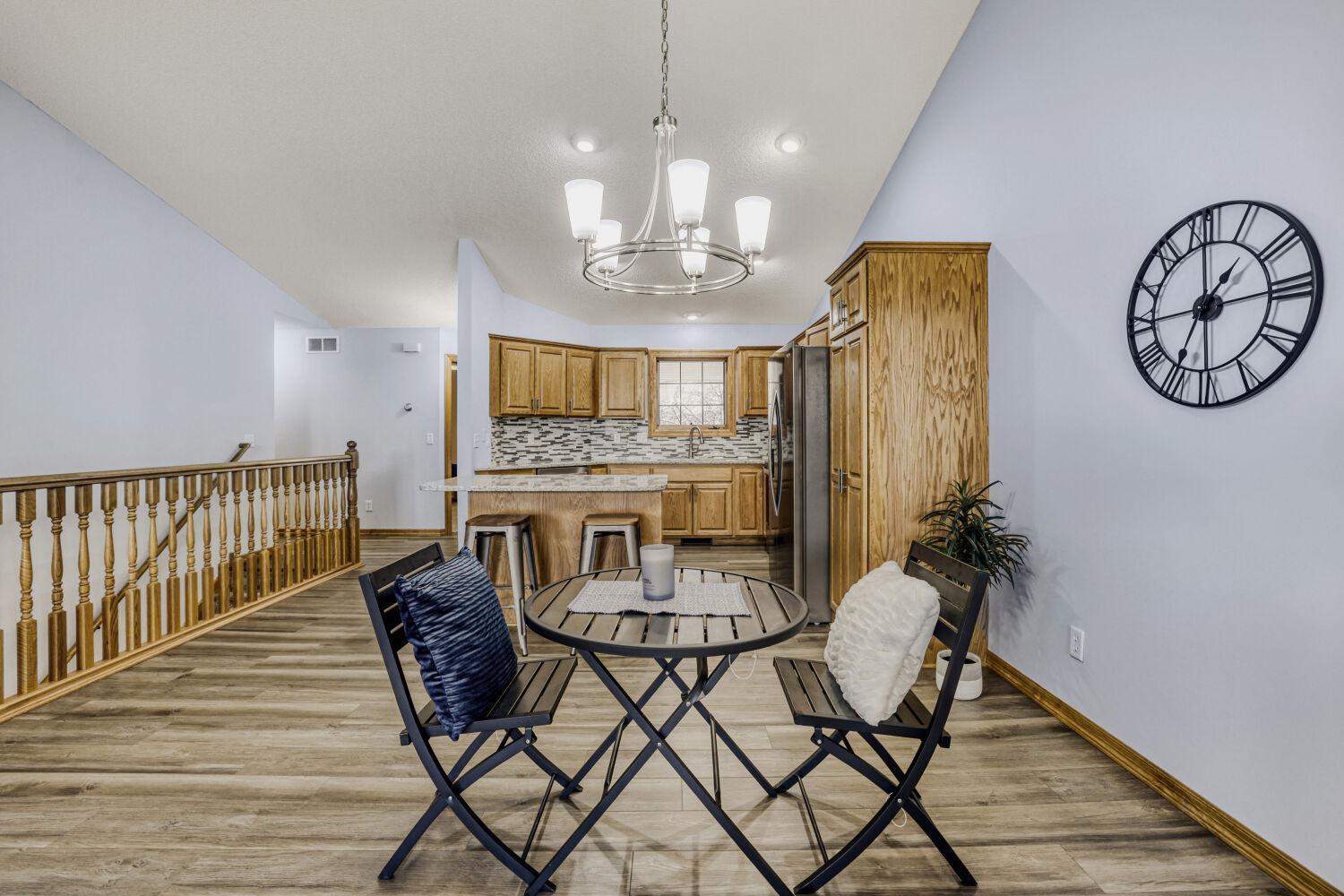 The home has all new lighting. Plenty of room in the dining area for a large family size table or a cozy table for two.