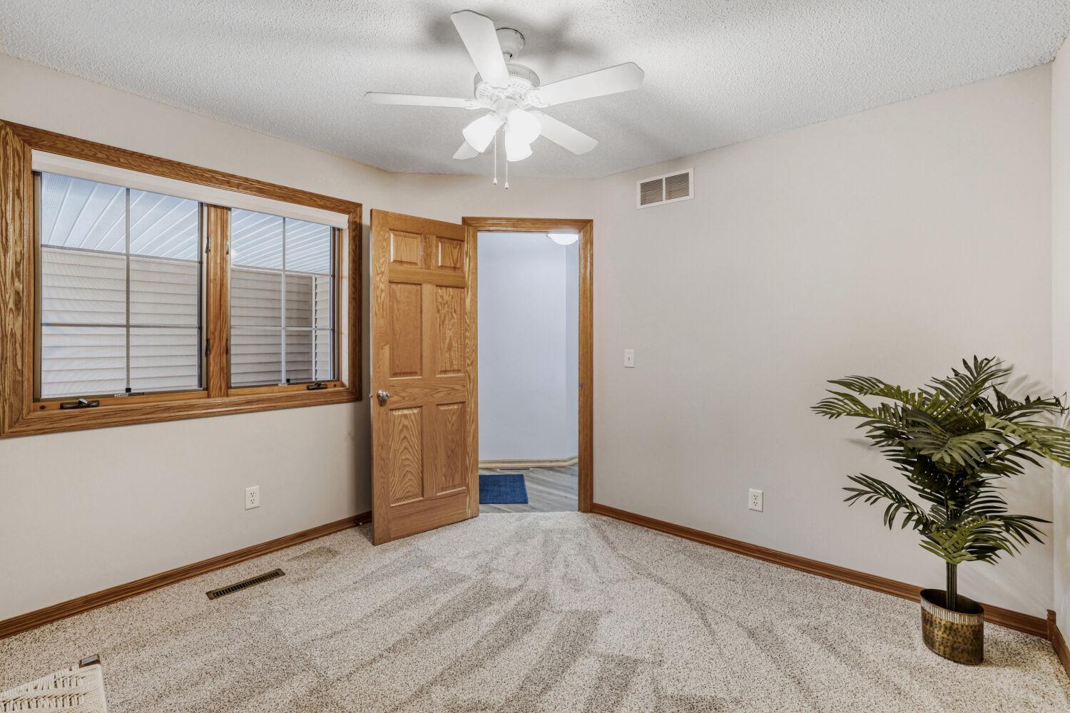 Right off the front entrance you'll find main floor bedroom #2 that could be used as an office or media room. Large windows provide lots of natural light.