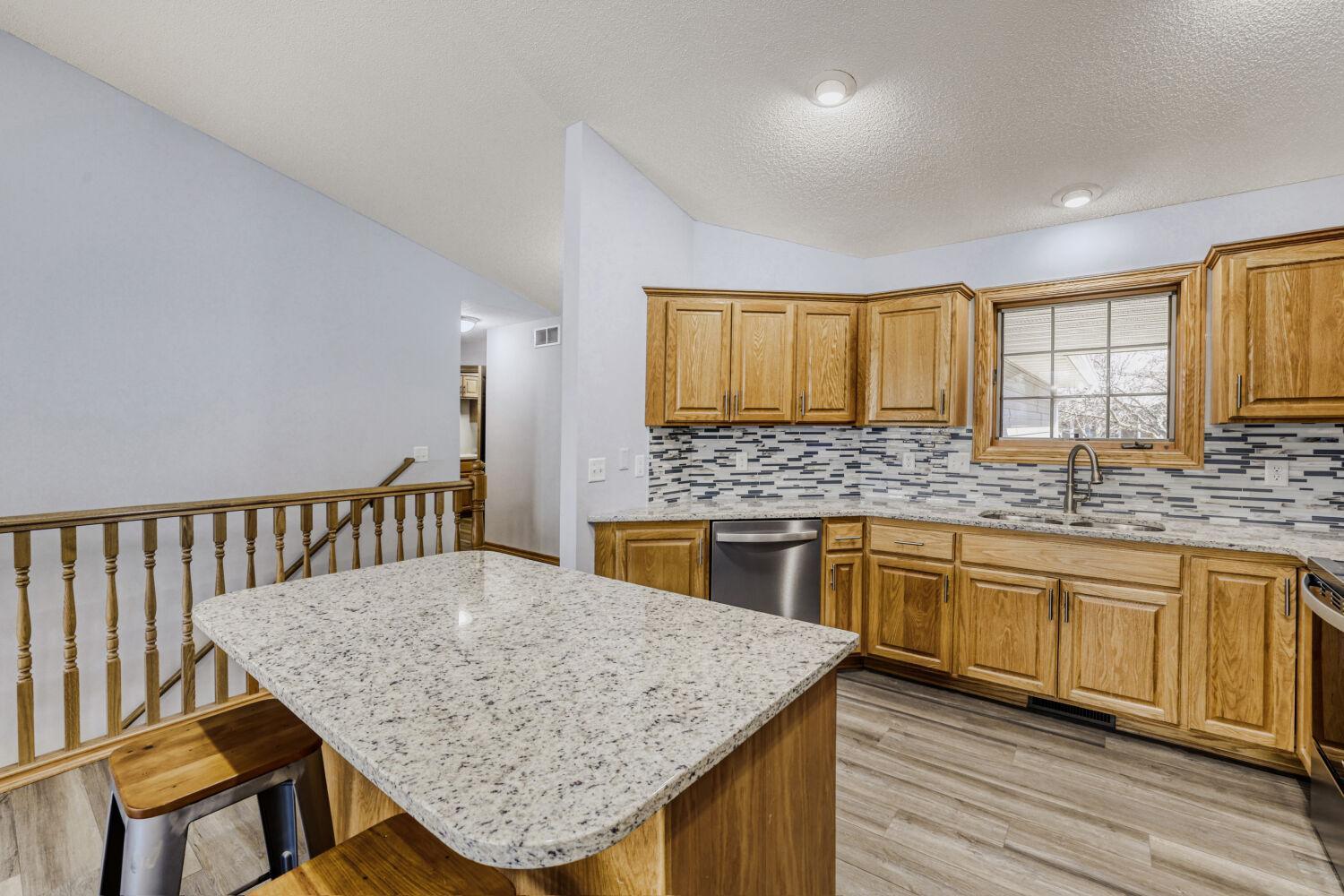 The dining area, kitchen, foyer, laundry room, 3/4 bathroom and hallway all have new luxury vinyl plank flooring.