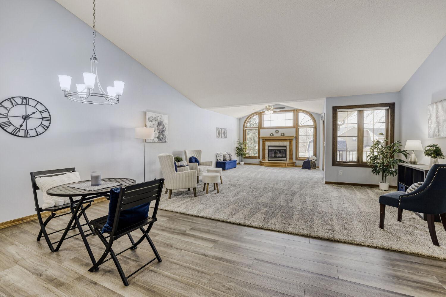 Open concept living with a vaulted ceiling makes the room very large. It appears much larger on the inside than it looks on the outside.