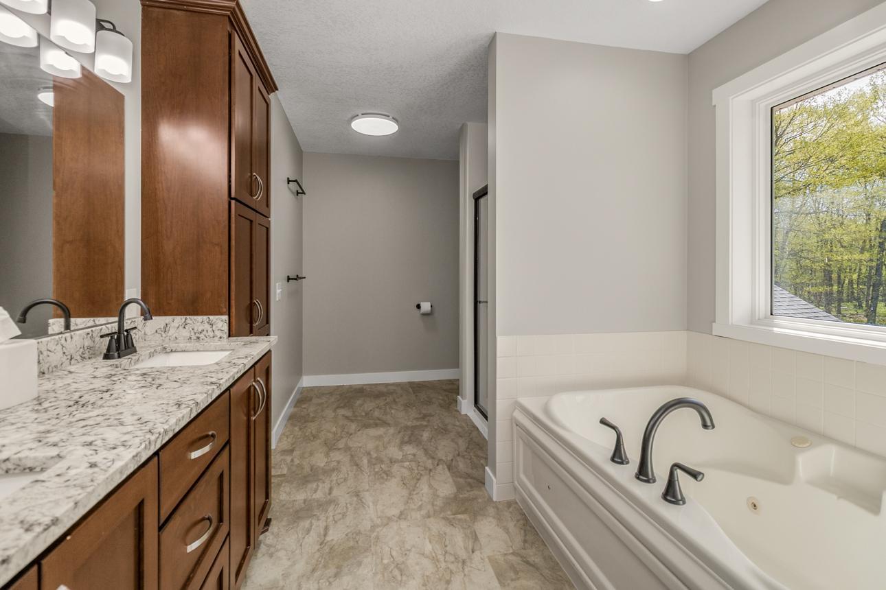 Soaking Tube and Walk-In Shower in Primary Bath