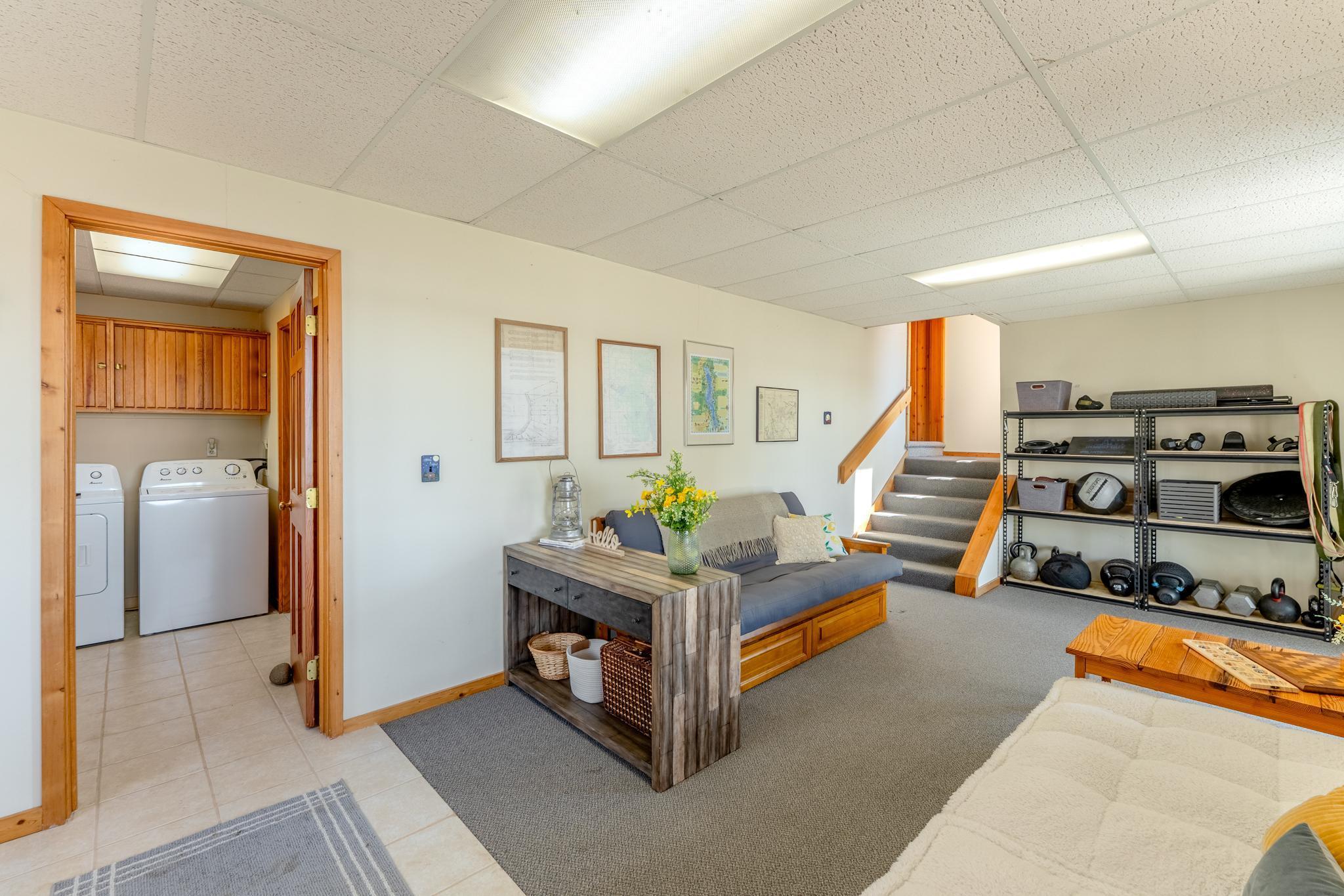 Right off the flex space is the laundry room and one of the bathrooms. Come off the lake and access it without running through the house.