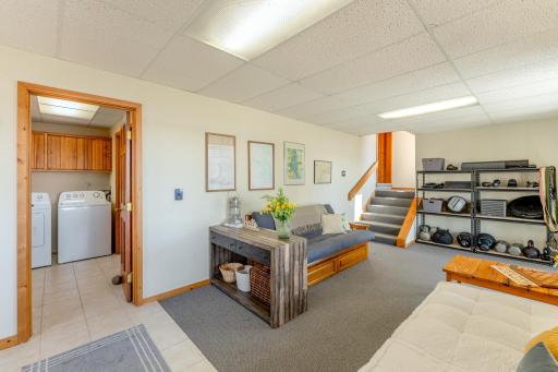 Right off the flex space is the laundry room and one of the bathrooms. Come off the lake and access it without running through the house.