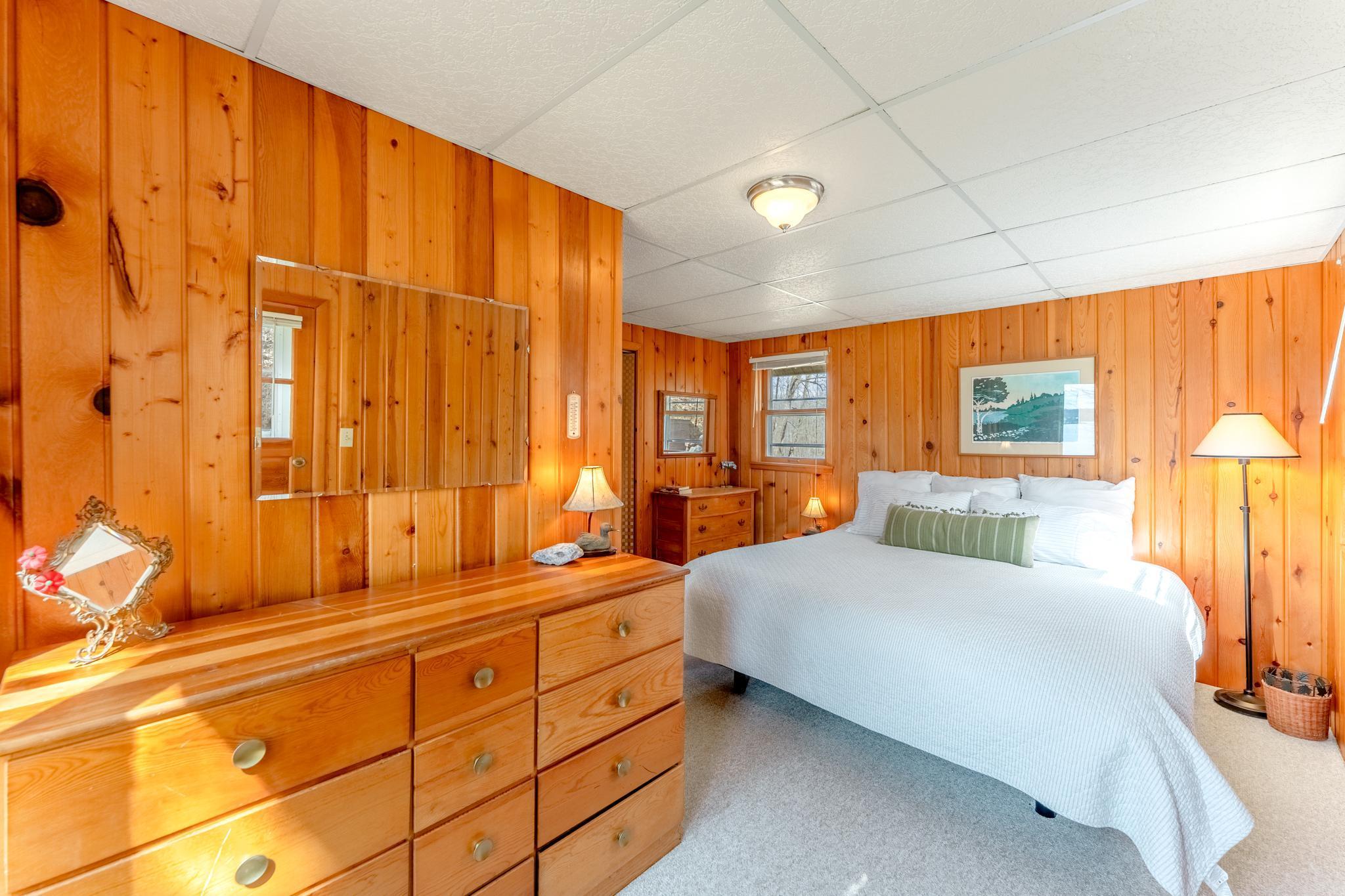 The primary bedroom boasts room for a king bed and lots of storage.