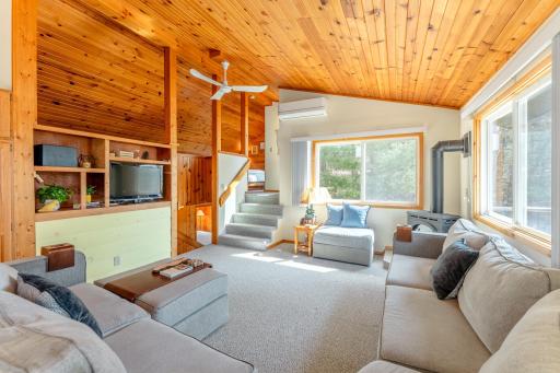 The living room is the perfect gathering place. Spacious and cozy at the same time.