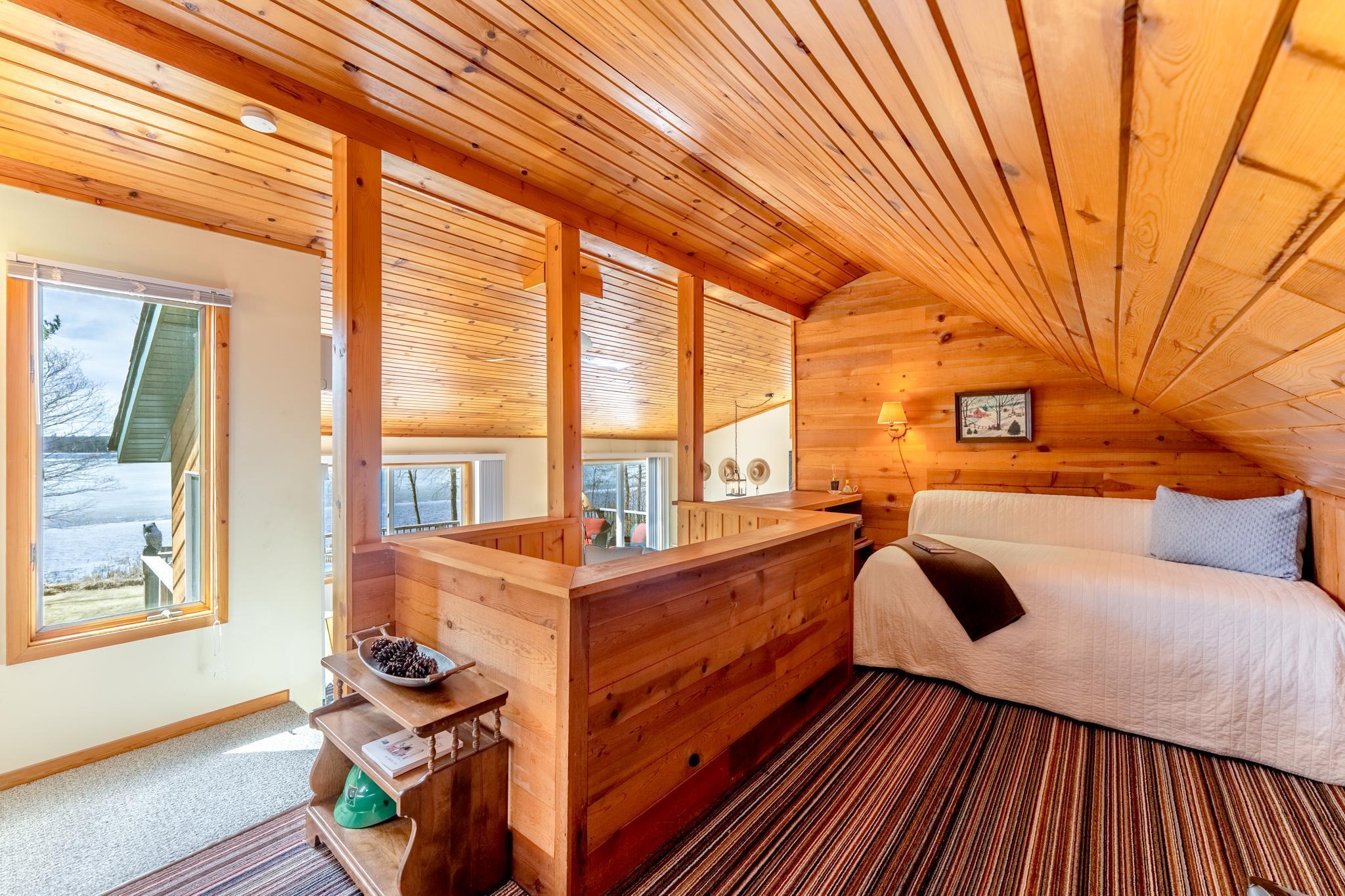 The loft has the quintessential cabin feel.