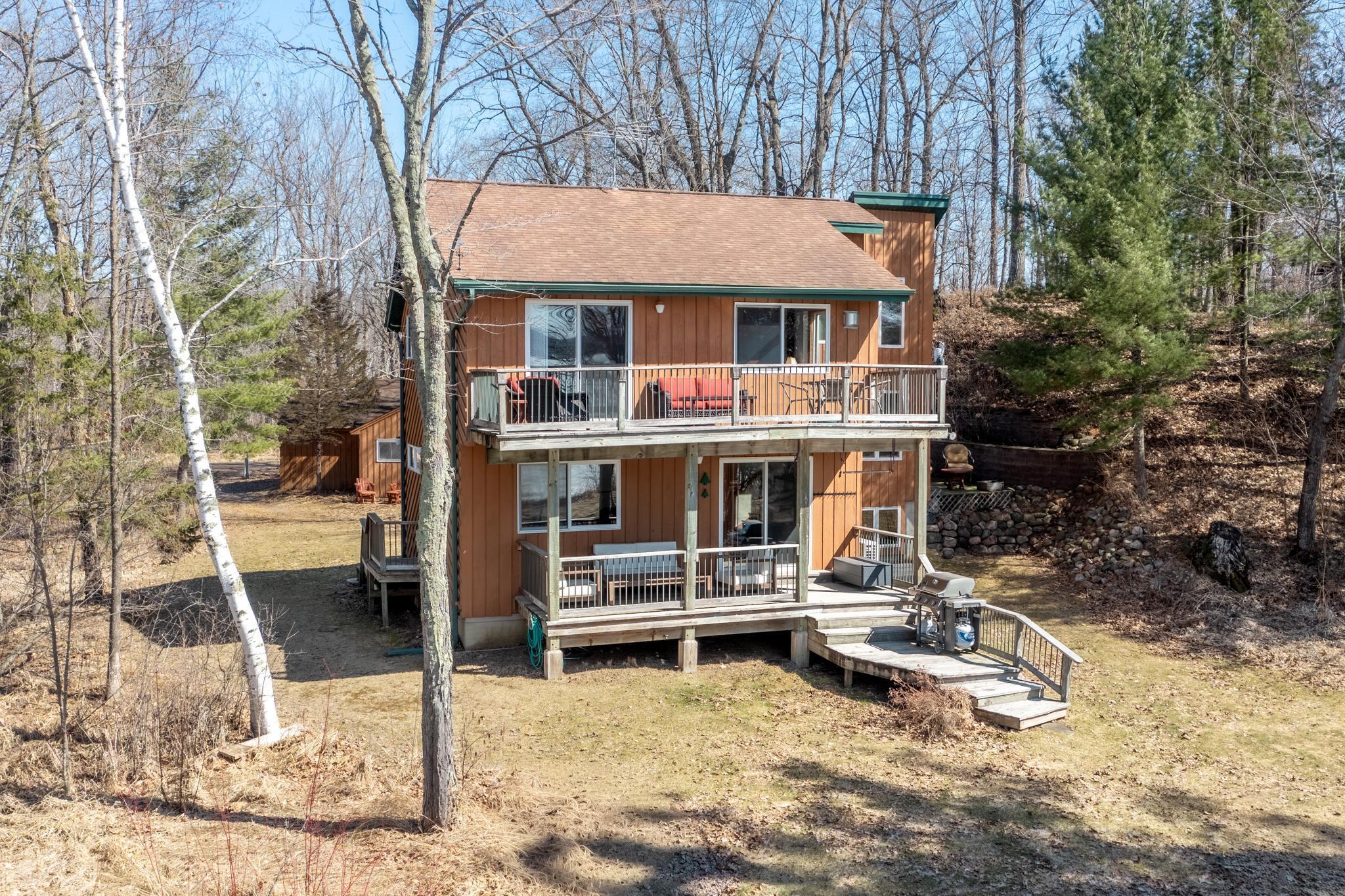 View of the covered deck and balcony. The views are incredible.
