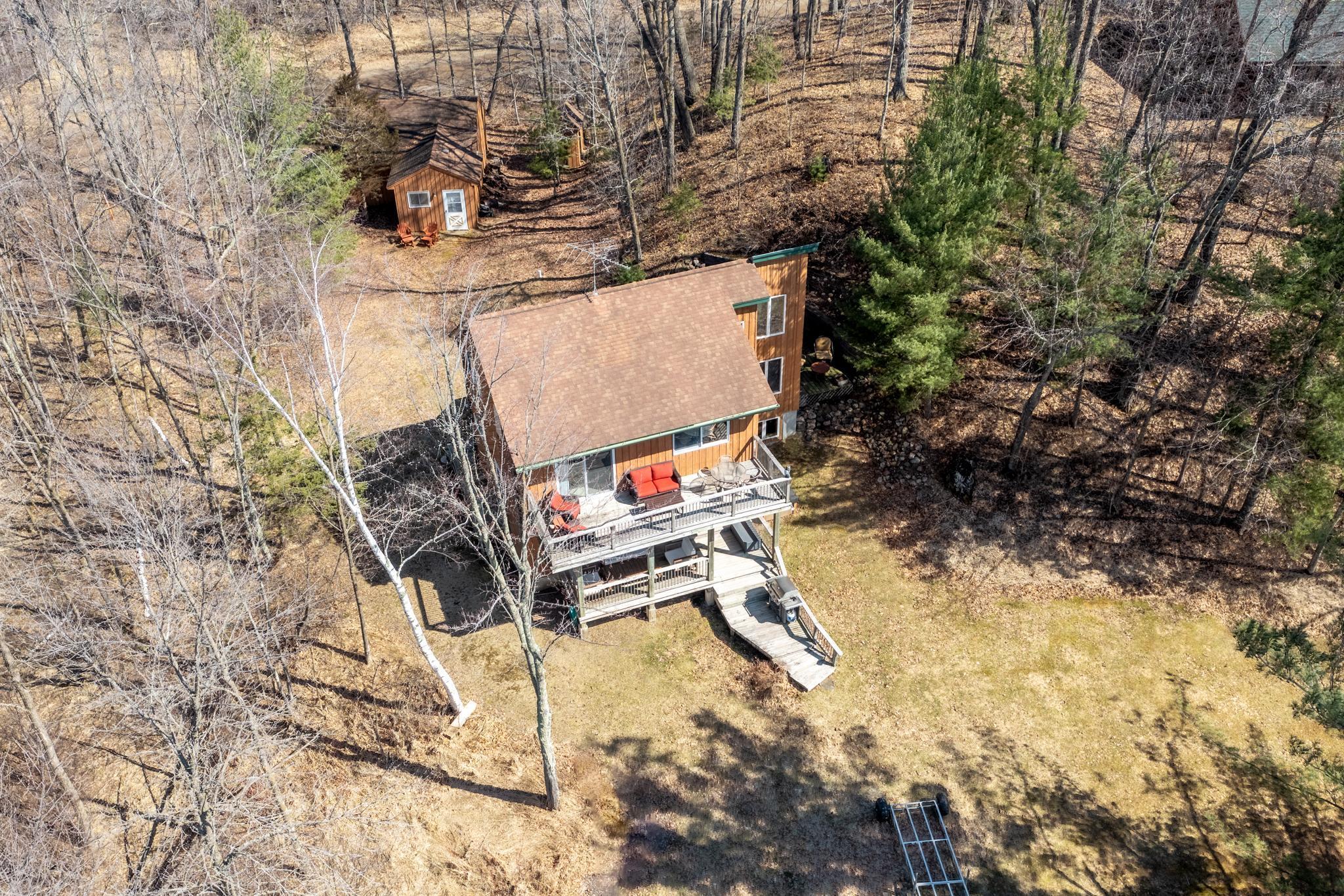 Large lot with detached garage and workshop.