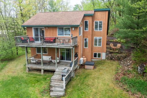 Enjoy the private patio (at right), accessed through the primary bedroom.