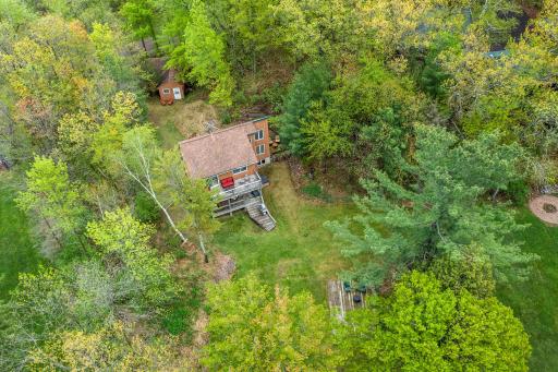 Large lot with detached garage and workshop.
