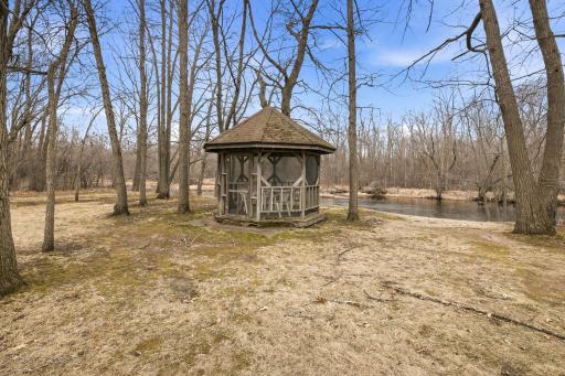 Enjoy The Idyllic Setting From This Level Lot With Stunning River Views. A Scenic Wooded Backyard Leads Down To The Water, Making It Easy To Fully Appreciate The Natural Beauty!