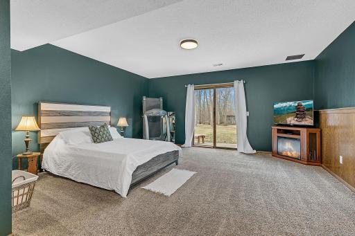 Amazing Walk-Out Lower Level Currently Set Up As A Bedroom, This Area Is Large Enough To Function Perfectly As A Very Spacious Family Room, Ideal For Daily Living And Hosting Large Gatherings.