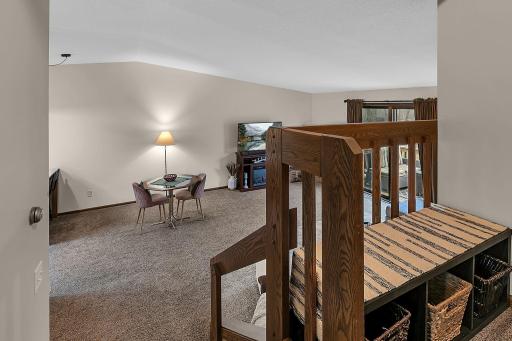 Lofted Area With Generous Space And An Airy Feel, Offering Open Views Of The Integrated Living, Dining, And Kitchen Areas Below.