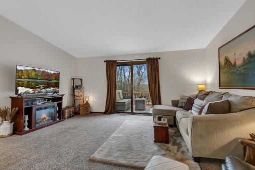 The Open, Light-Filled Living Room Transitions Seamlessly To The Updated Back Deck, Providing An Effortless Connection To The Outdoors And A Spectacular Views Of The River.