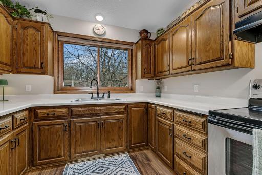 Thoughtfully Designed, Ready For Entertaining Kitchen Features Custom Cabinetry, Stainless Steel Appliances, Finished In Warm Neutral Colors Perfectly Positioned For Entertaining, Overlooking A Spacious Living-Dining Area!