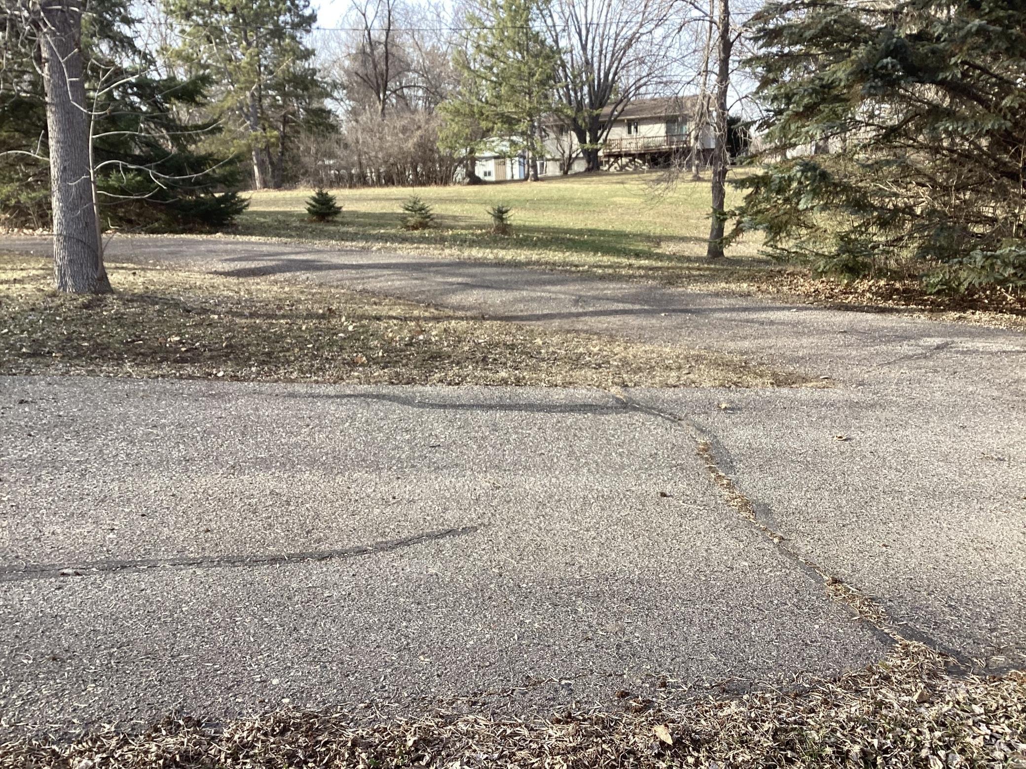 Tar Drive way to garages and shed