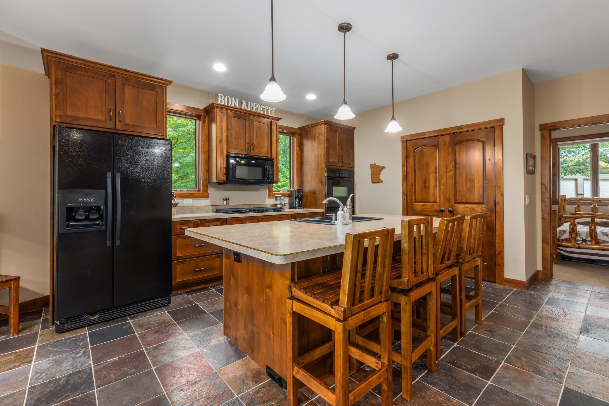 Kitchen w/Island & Pantry