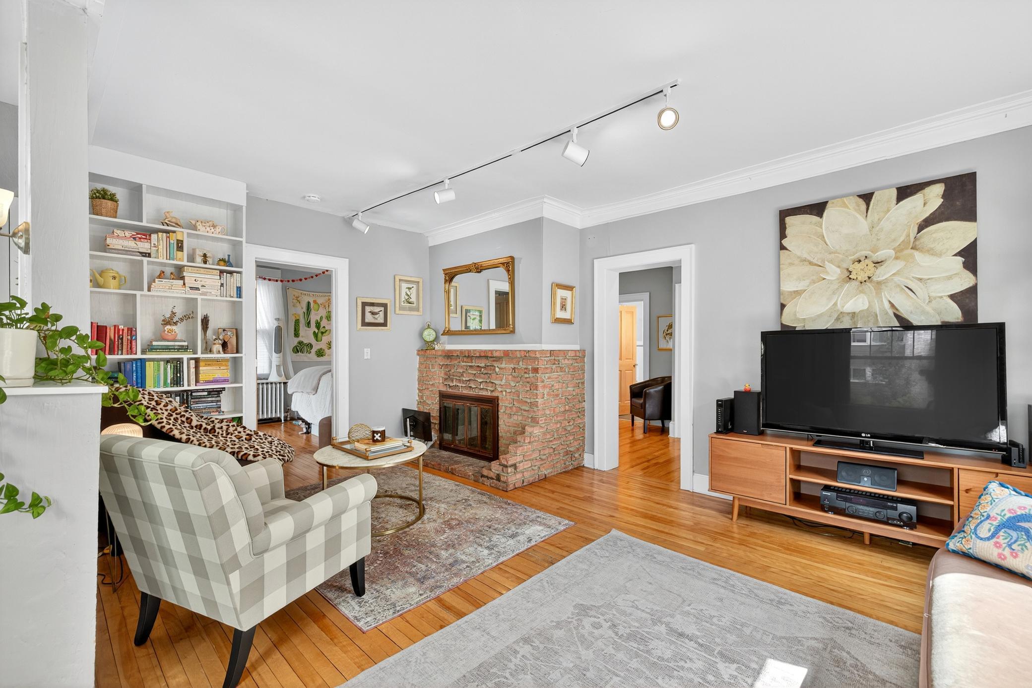 Charming living room with decorative fireplace