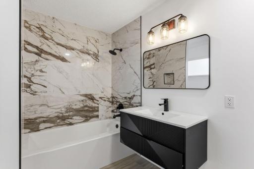 Enjoy the convenience of a full upstairs bathroom with in-unit laundry—making everyday living easier