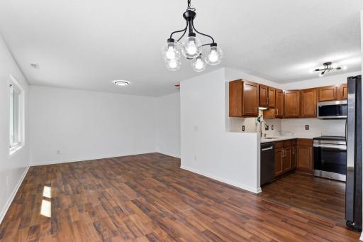 Seamless flow between kitchen, dining, and living spaces