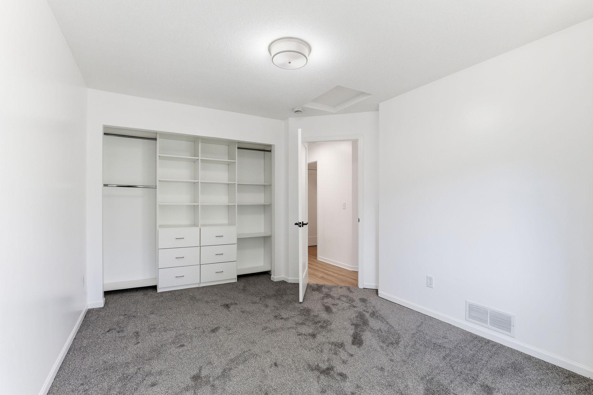 Comfortable second bedroom perfect for guests, a home office, or additional living space”