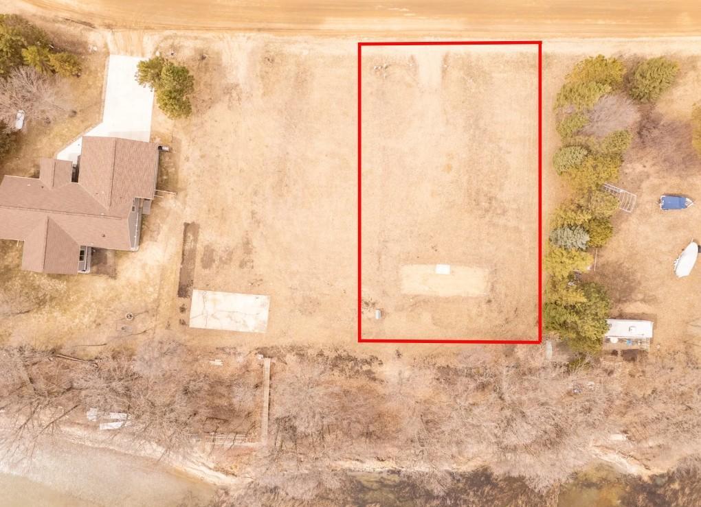 .49 Acre lot with 105 Feet of shoreline.