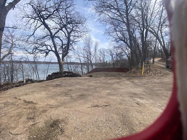 view of lot and trail to south