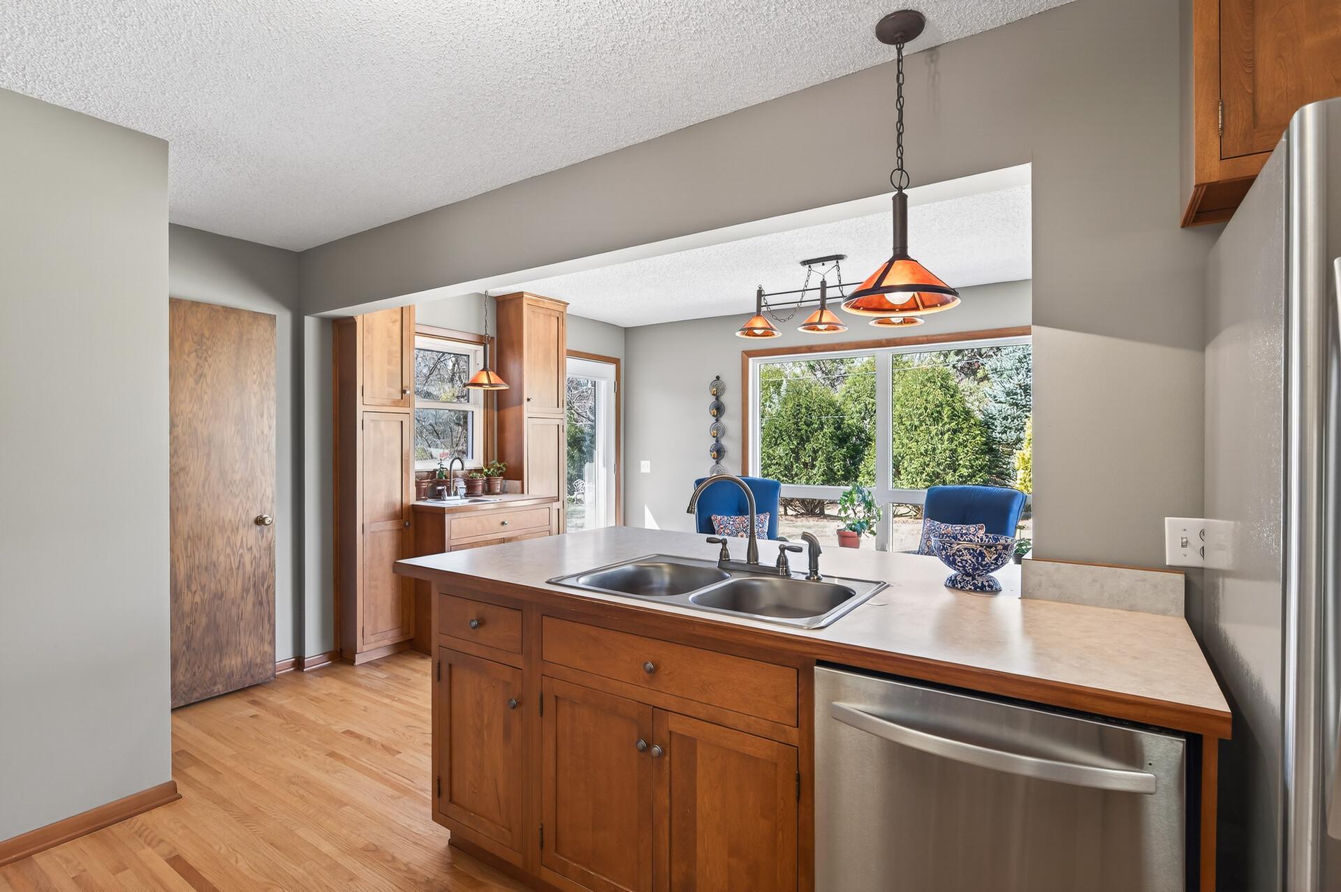 Peer into backyard from your kitchen sink.