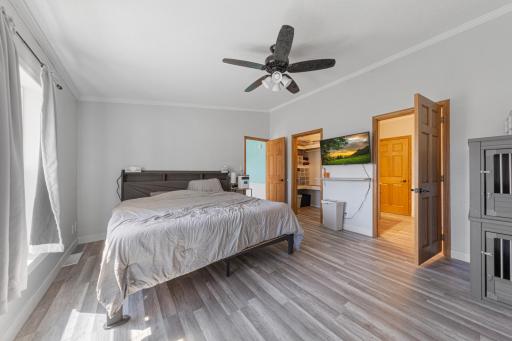 Primary bedroom with crown molding