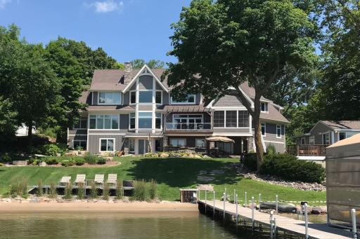 This exceptional estate features 7 bedrooms and 7 bathrooms, complemented by a private attached in-law suite and separate guest cottage