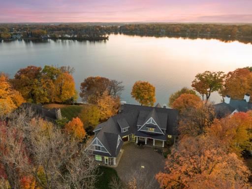 Striking, timeless architecture sets the tone for this breathtaking lakefront estate