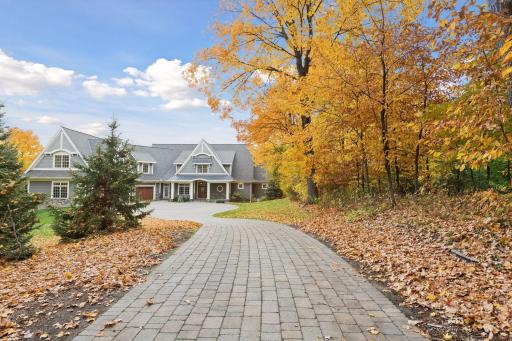 Long, tree-lined drive enhances privacy