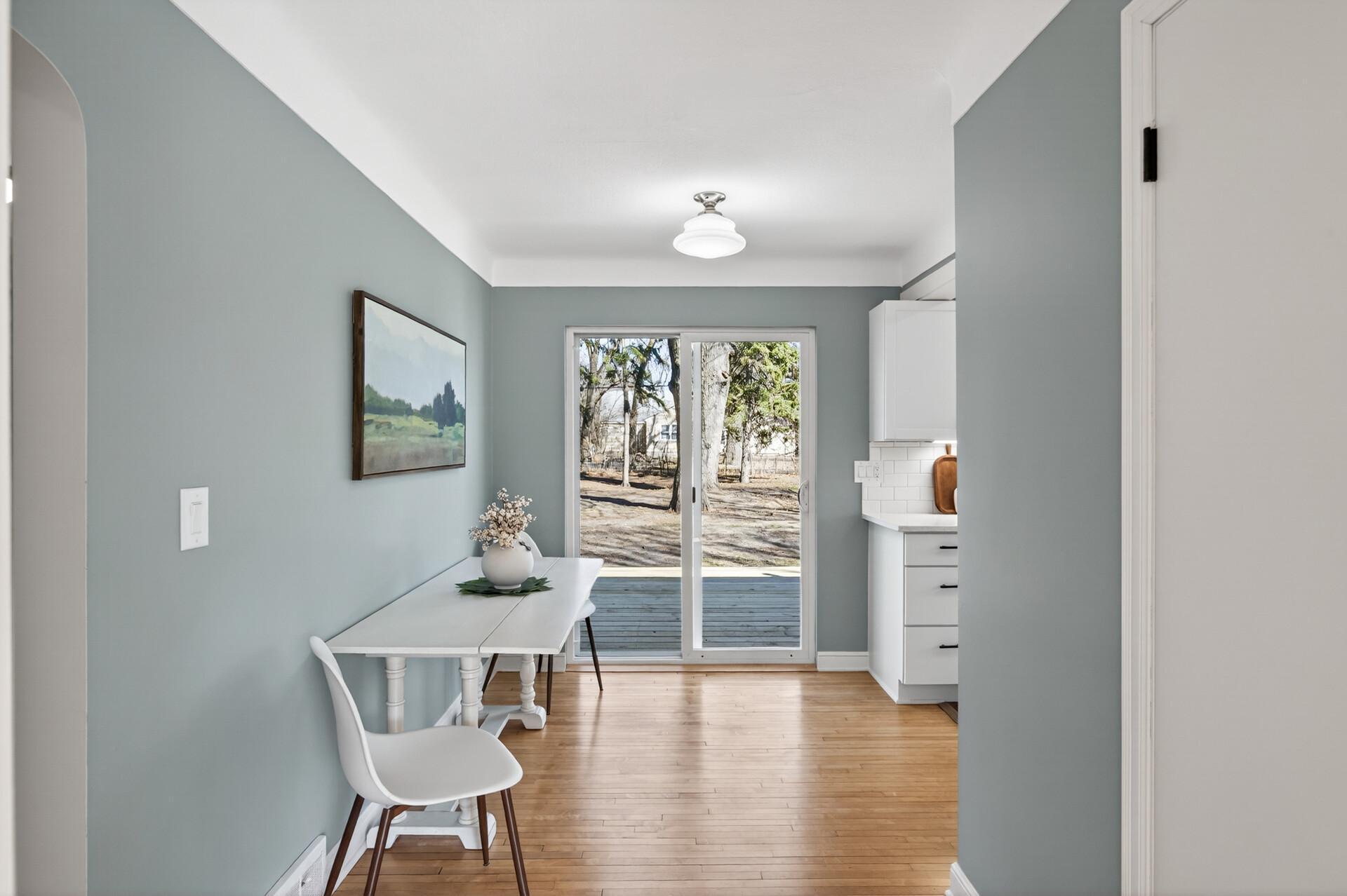 Flow into the informal dining area with walkout access to the deck and backyard, seamlessly extending your living and entertaining space outdoors.