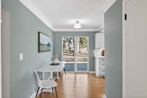 Flow into the informal dining area with walkout access to the deck and backyard, seamlessly extending your living and entertaining space outdoors.